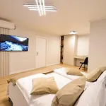 One By One - By Grand Accommodation